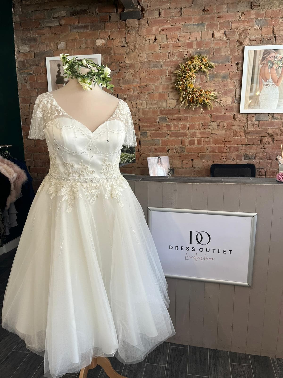 View of Chloe Bridal Gown on a mannequin.