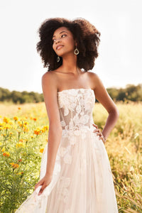 Close up view of boned bodice with sequined appliqués.